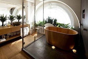 Bathroom with a wooden tub