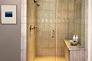 Bathroom with wall seats in the shower