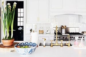 Kitchen with brass water faucet