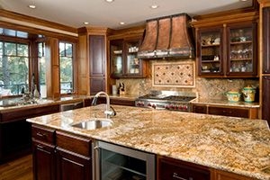 Kitchen with thin granite or quartz counters