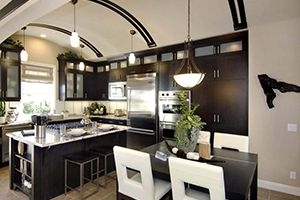 Designer in kitchen designing
