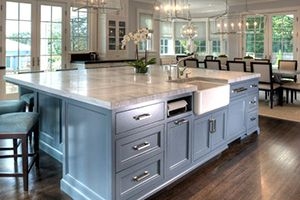 Kitchen with large island with quartz counters