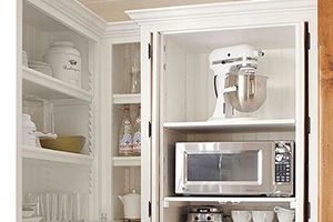 counter with an appliance garage with doors that slide open