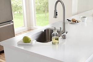 kitchen or bath with solid surface counters