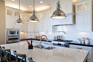 kitchen with pots on top of a marble counter