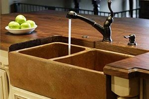 wooden countertop with a sink