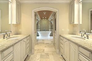 bathroom with white/green/beige colored granite