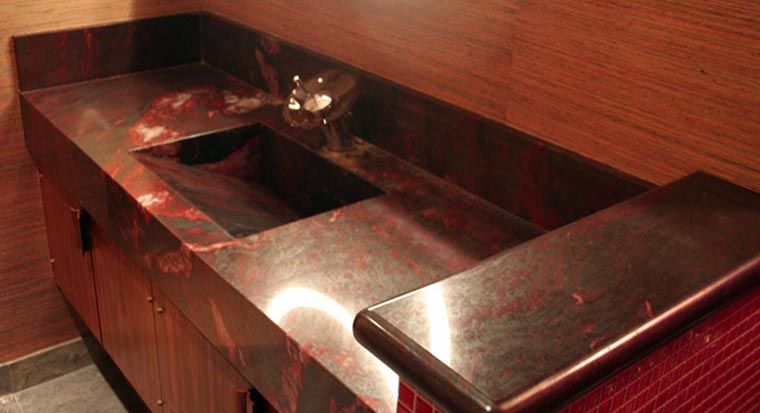 marble countertop with integrated sink in bathroom