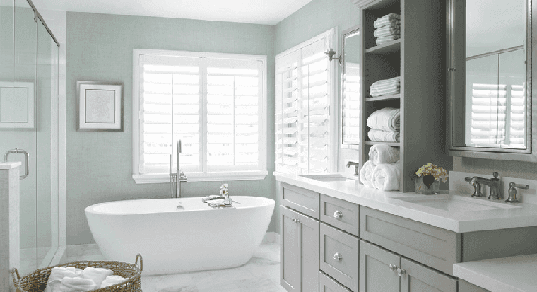 bathroom in a solid color, not white, with matching vanity